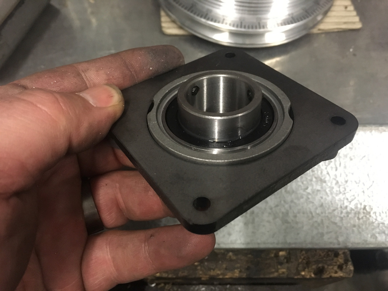 Mounting plate - This is the inside of the mounting plate. As you can see it completely supports the bearing